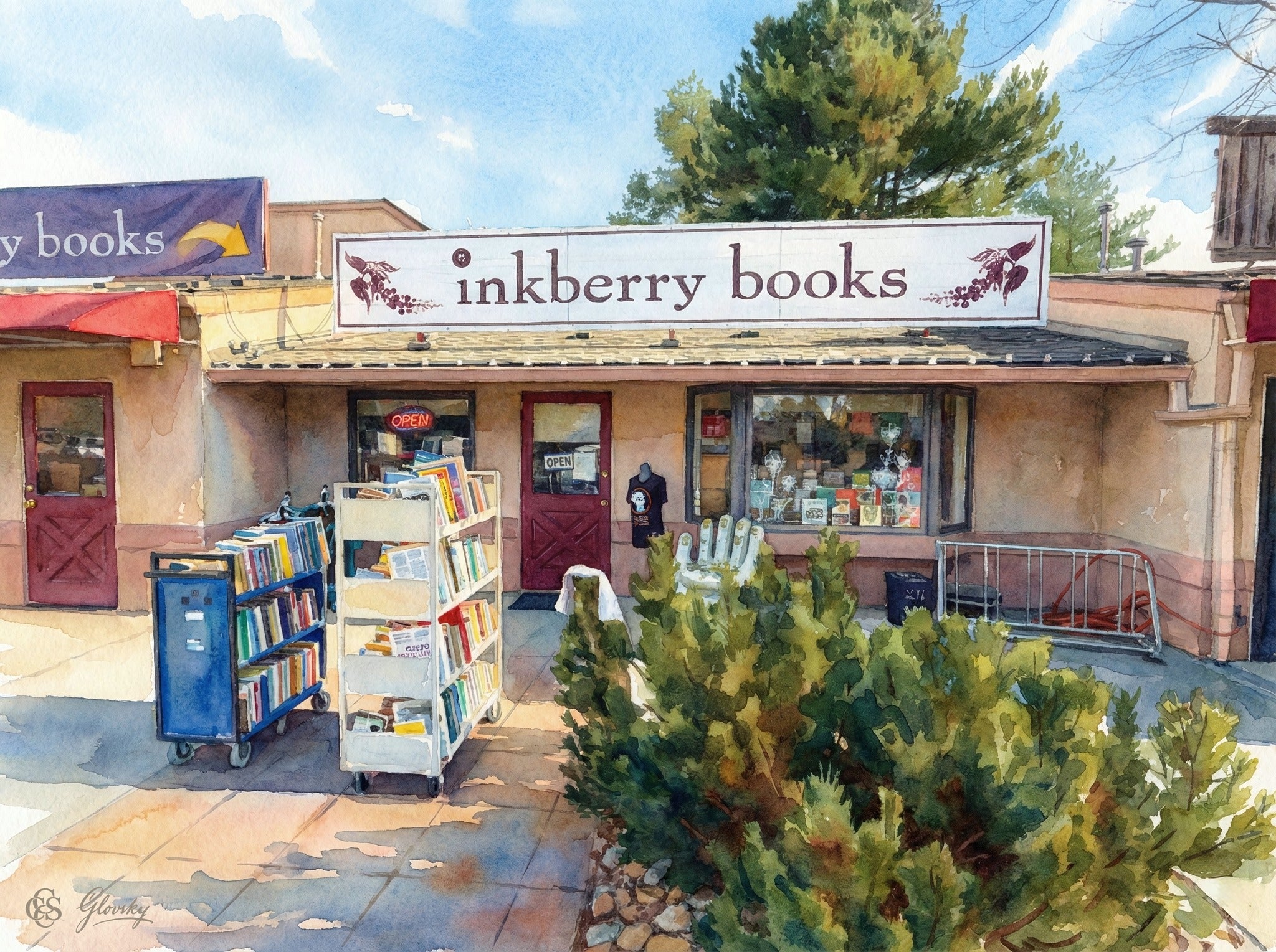 Whimsical Renoir-style watercolor of Inkberry Books in Niwot, featuring colorful rolling book carts and the iconic white hand chair.